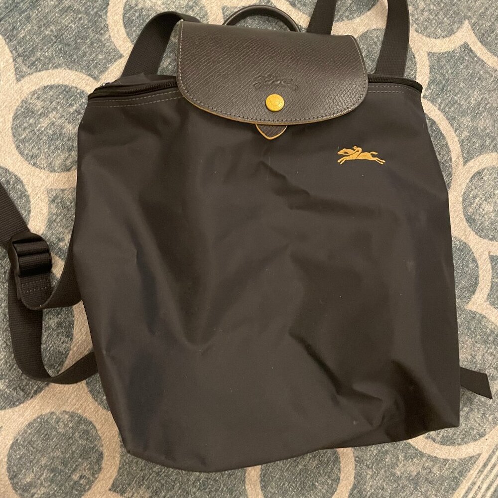 Longchamp’s “LE PLIAGE ORIGINAL BACKPACK”